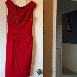 Red knee-length dress. Women’s size 6. VGUC
